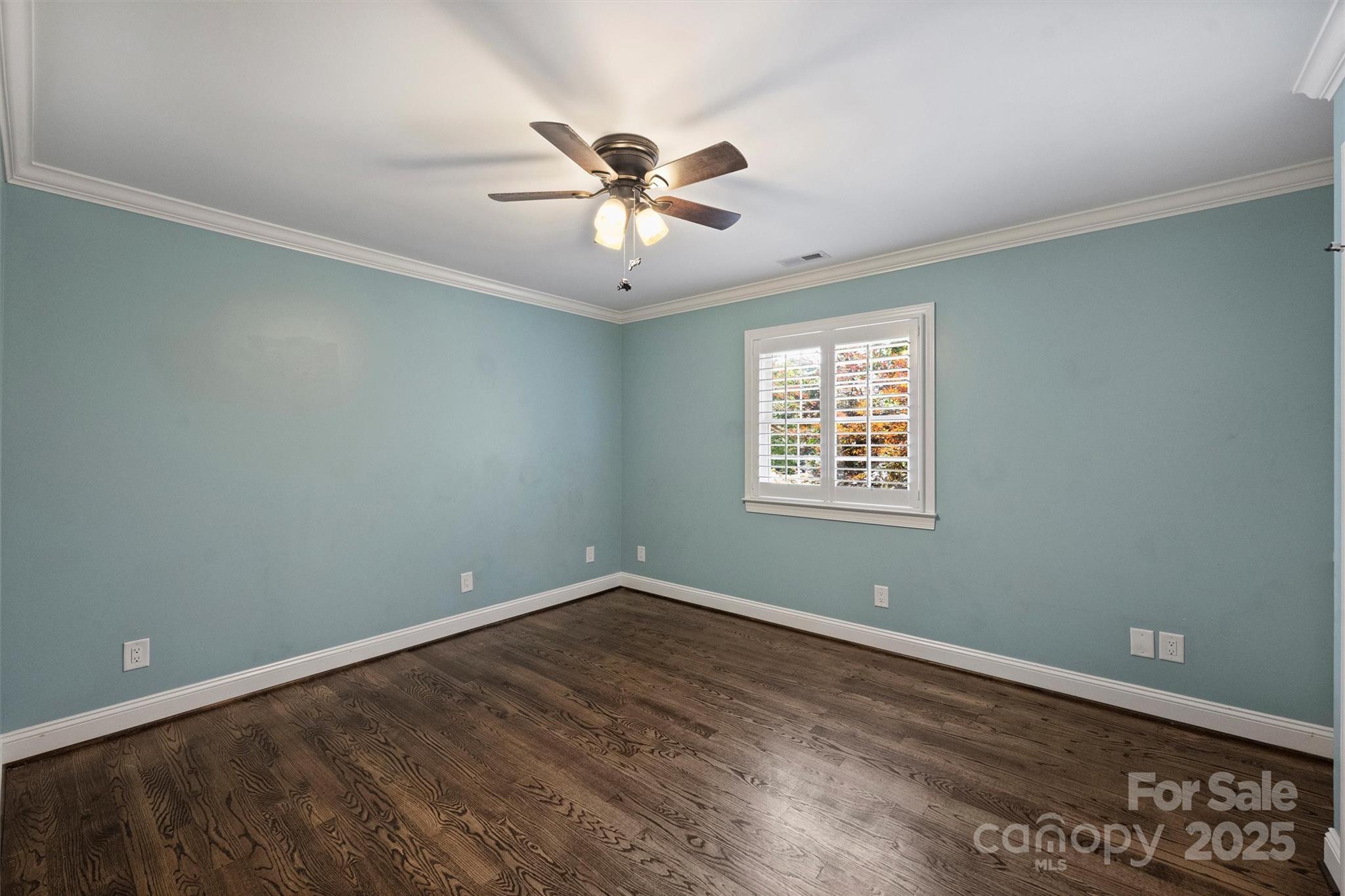 1008 Dumbarton Road Gastonia, NC 28054 - Photo 33 of 40 a view of a big room with wooden floor and windows in a room