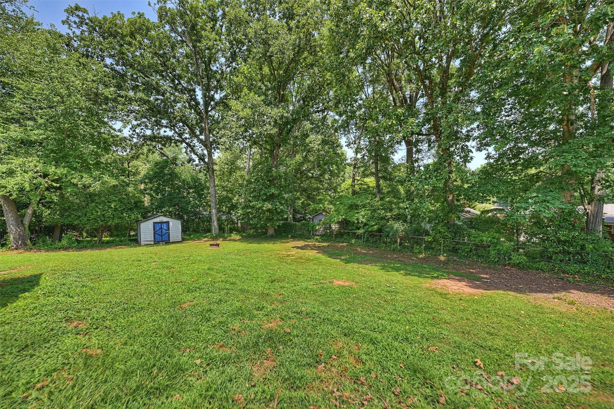 1008 Dumbarton Road Gastonia, NC 28054 - Photo 38 of 40 a view of a trees with a yard