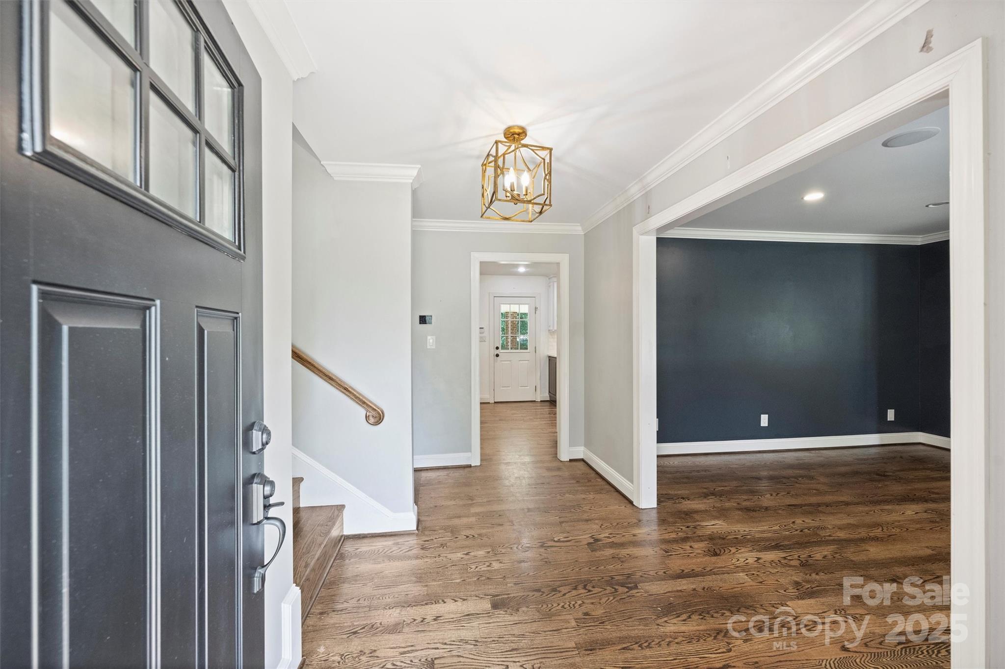 1008 Dumbarton Road Gastonia, NC 28054 - Photo 4 of 40 a view of a hallway with wooden floor and livingroom view