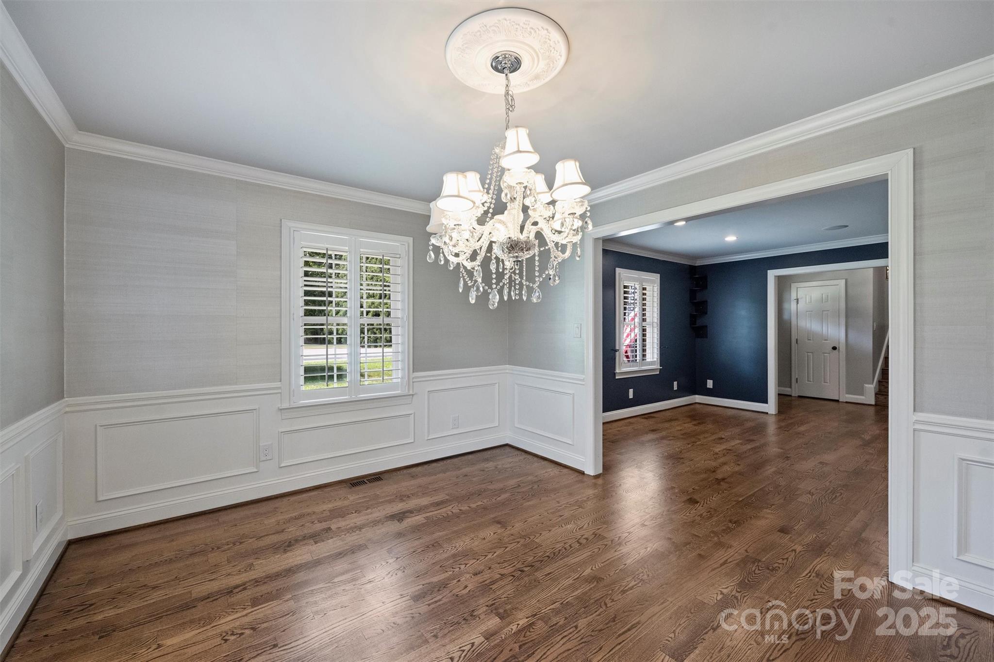 1008 Dumbarton Road Gastonia, NC 28054 - Photo 9 of 40 wooden floor in an empty room with a window