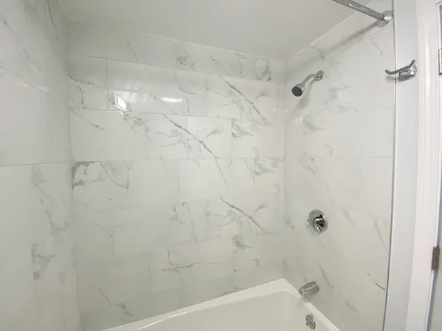 a bathroom with a bathtub