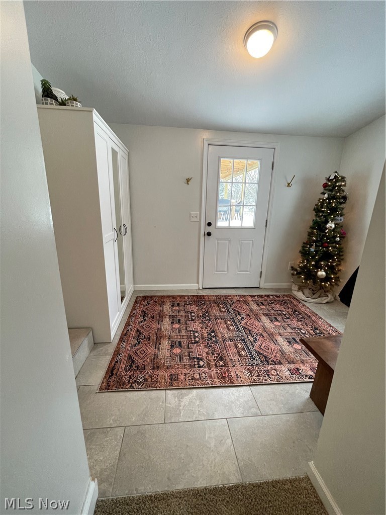6172 Stone Road Hudson, OH 44236 - Photo 18 of 25 Mud room with ceramic floor.