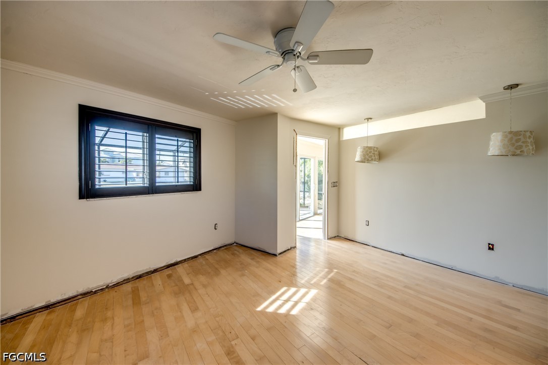 2701 Bruce Street Matlacha, FL 33993 - Photo 25 of 47 a view of an empty room with a window