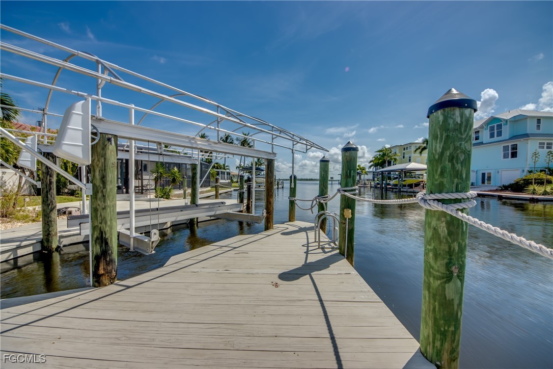 2701 Bruce Street Matlacha, FL 33993 - Photo 46 of 47 a view of a swimming pool with outdoor seating