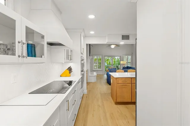 a view of a chair and table in the balcony