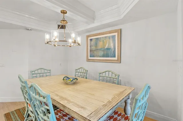 a living room with furniture and a stairs