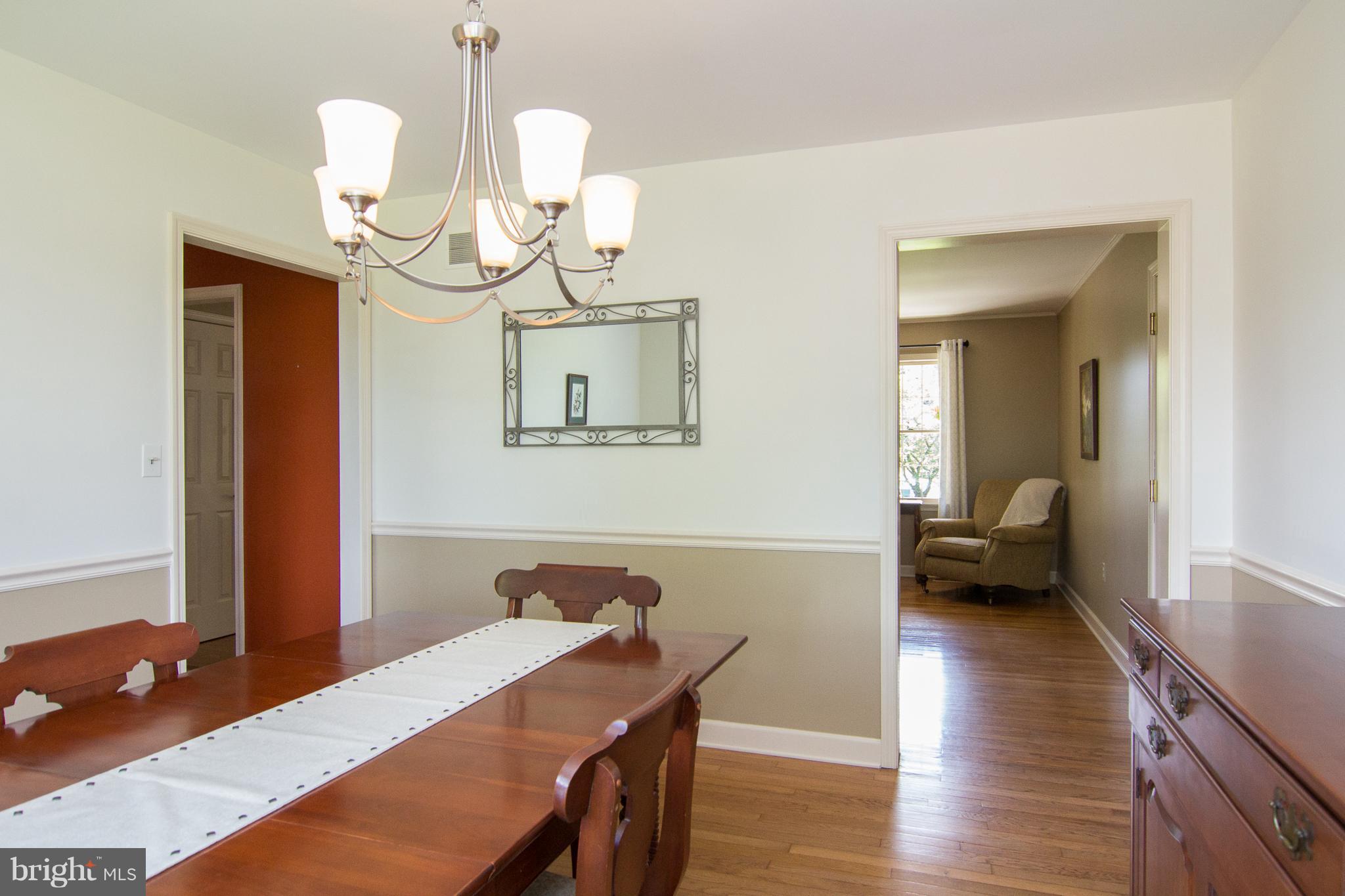 926 Gahle Road Westminster, MD 21157 - Photo 7 of 25 Dining Room with hardwood floors & chair rail