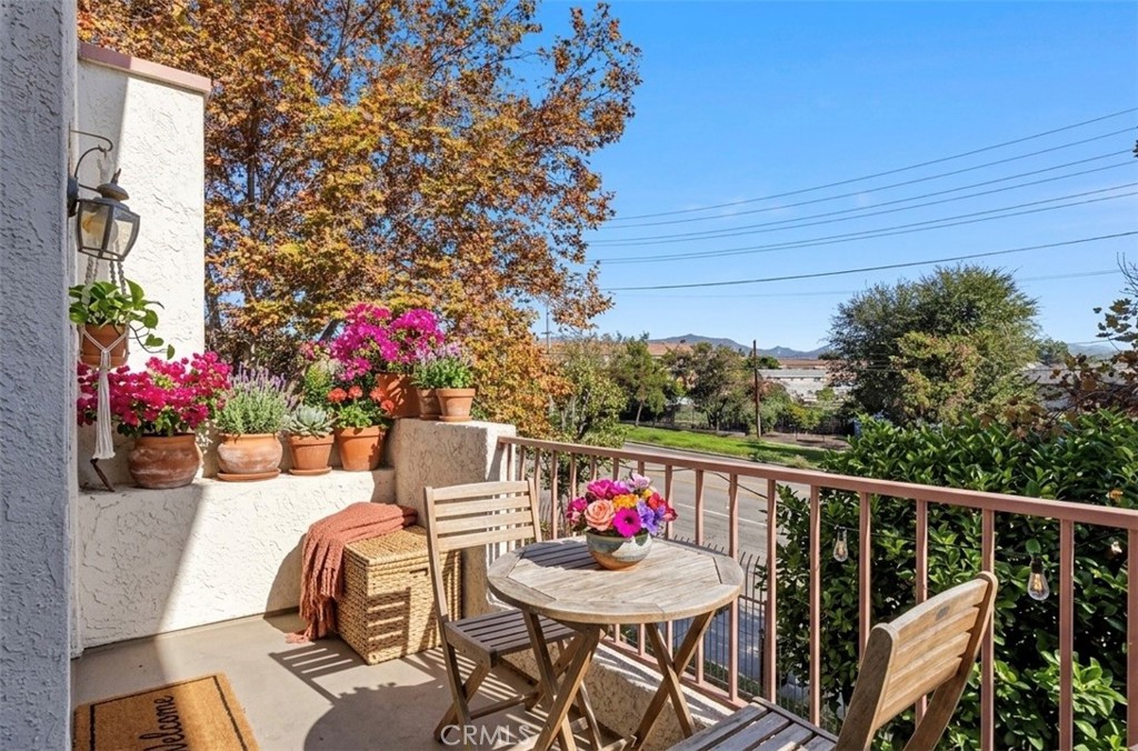 12411 Osborne Street, Unit 2 Pacoima, CA 91331 - Photo 9 of 37 a view of deck with furniture and flowers