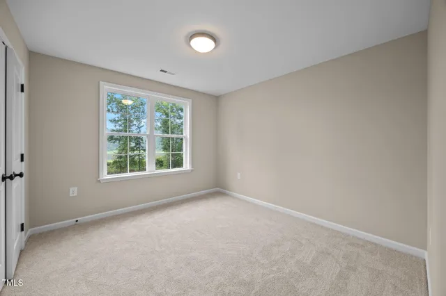 a bathroom with a sink toilet vanity and tub