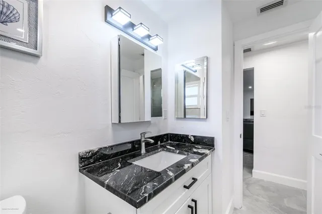 a view of a chairs and table on the terrace