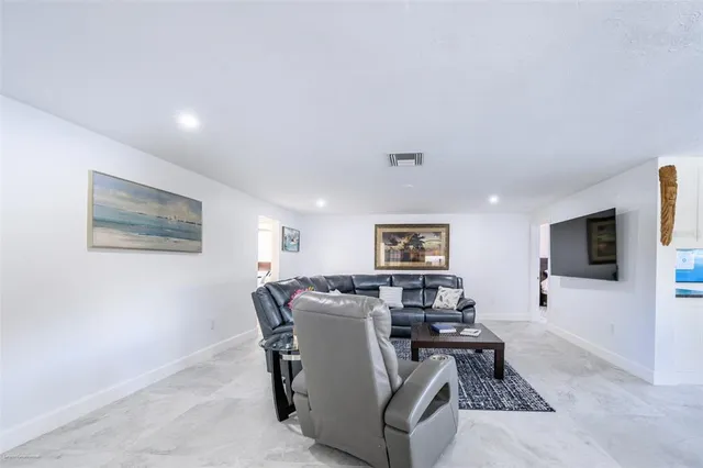 a living room with furniture and a couch