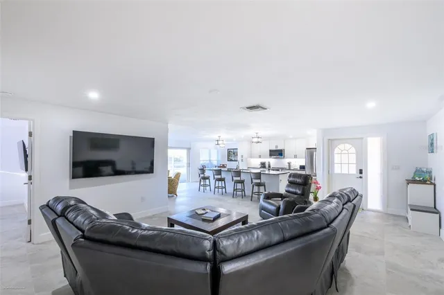 a view of a kitchen and dining room