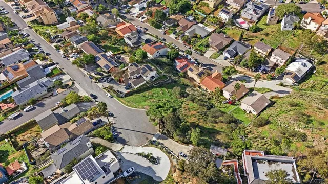 an aerial view of a city with lots of residential buildings