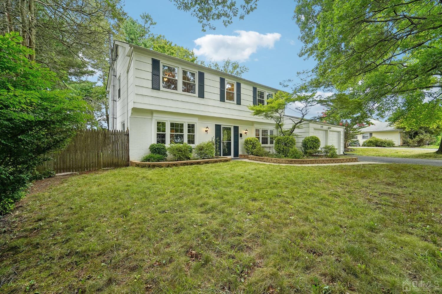 149 Lloyd Road Matawan, NJ 07747 - Photo 2 of 2 a front view of house with yard and green space