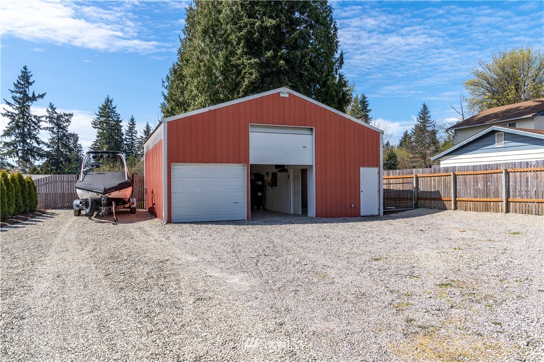 407 216th Street Southwest Bothell, WA 98021 - Photo 13 of 18 a view of a house with a yard