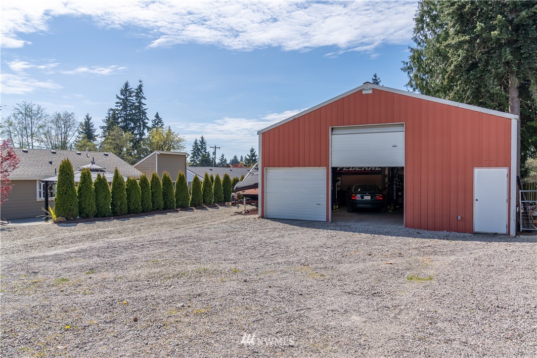 407 216th Street Southwest Bothell, WA 98021 - Photo 14 of 18 a house with a yard