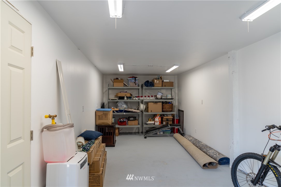 407 216th Street Southwest Bothell, WA 98021 - Photo 16 of 18 a view of a storage & utility room with toys