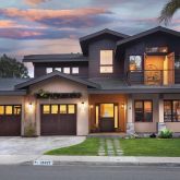 a front view of a house having yard