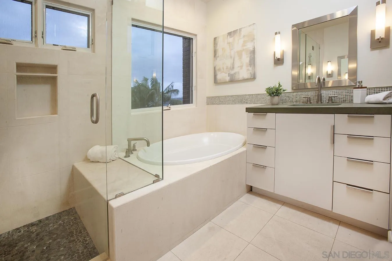 13497 Calais Drive Del Mar, CA 92014 - Photo 16 of 22 a bathroom with a granite countertop sink and a mirror