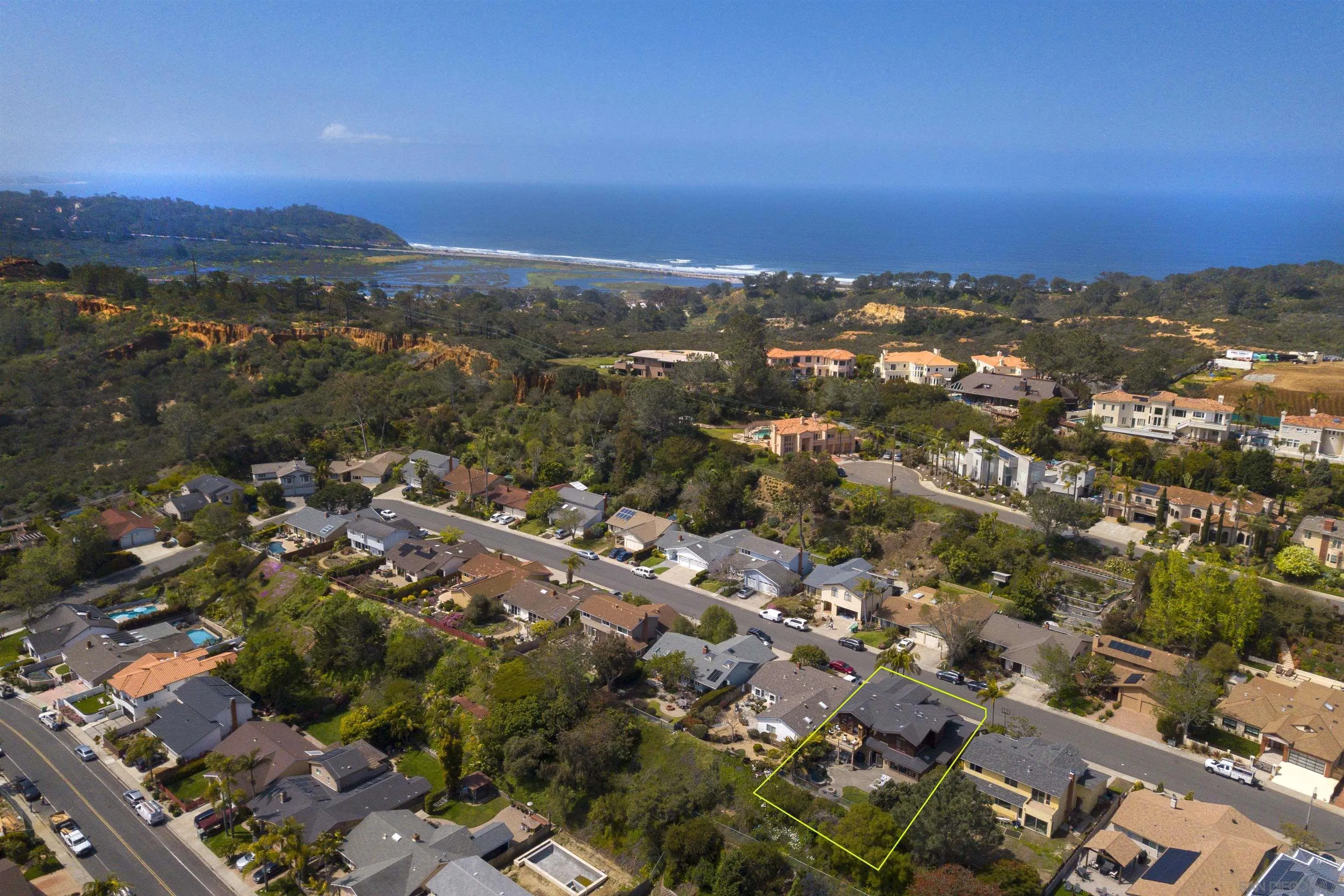 13497 Calais Drive Del Mar, CA 92014 - Photo 7 of 22 an aerial view of residential houses with city and mountain view in back