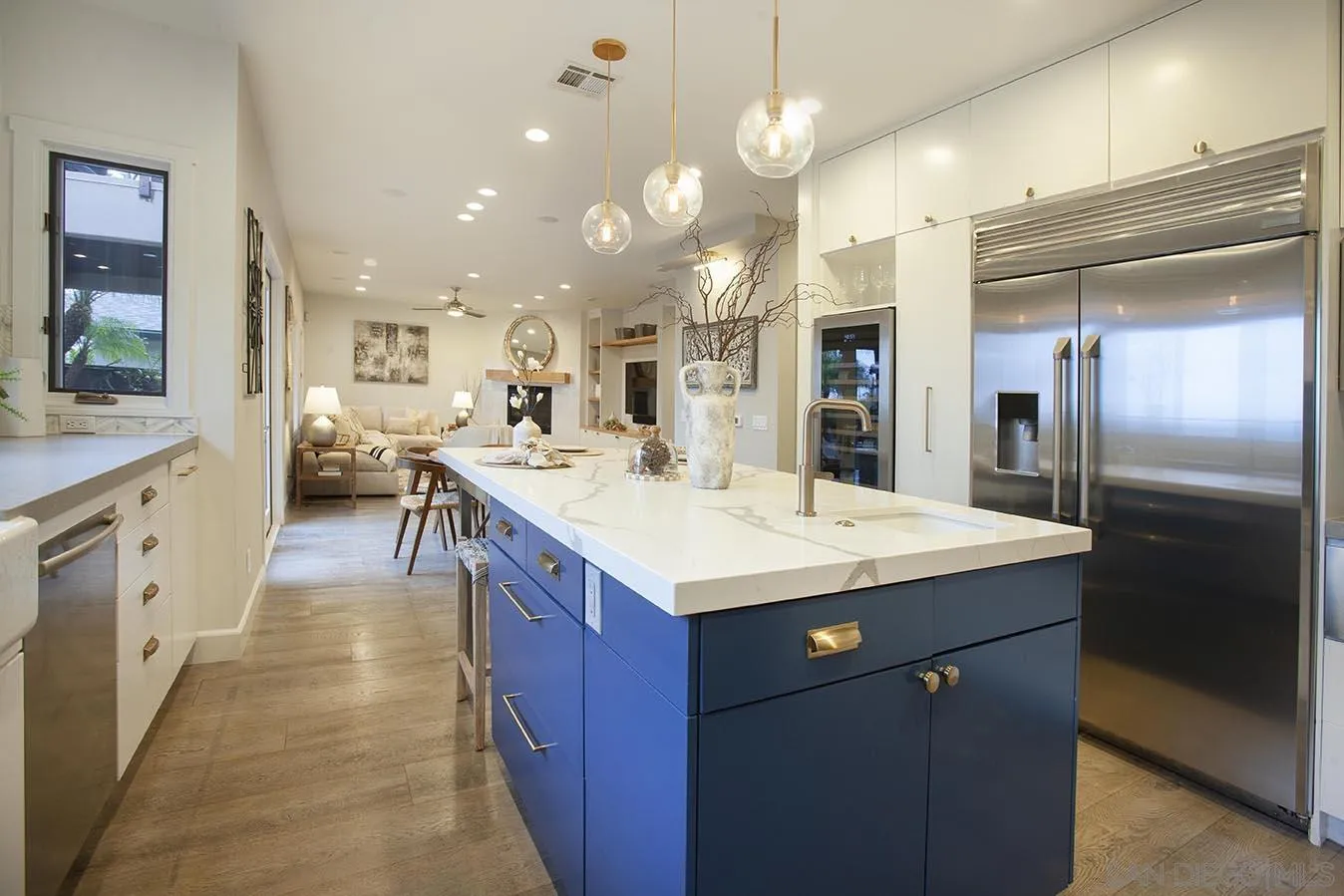 13497 Calais Drive Del Mar, CA 92014 - Photo 9 of 22 a kitchen with a sink and a refrigerator