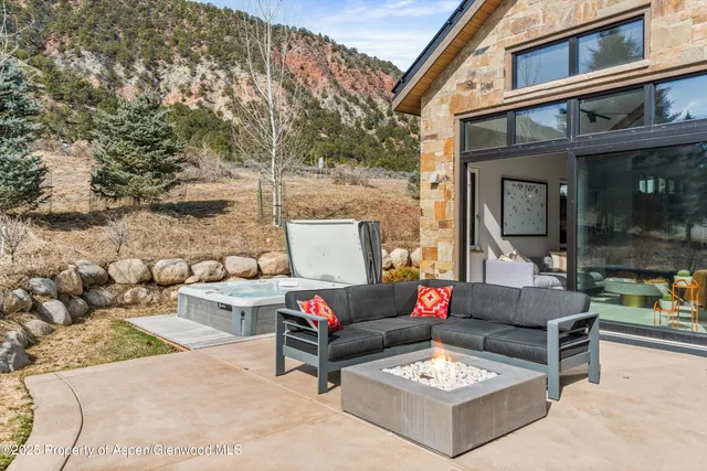 a view of a golf course with a lake view
