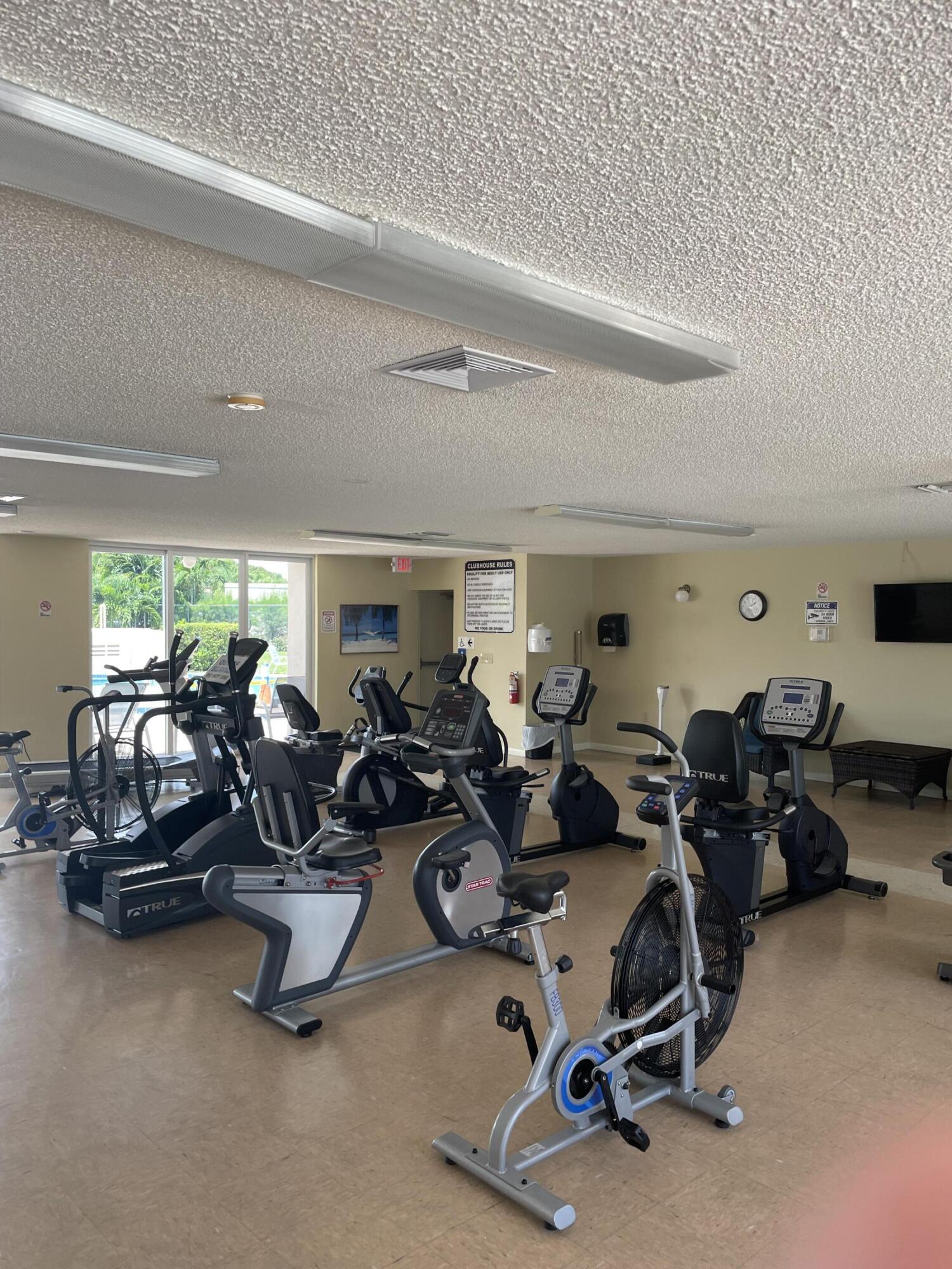 506 Davis Road, Unit 78 Palm Springs, FL 33461 - Photo 32 of 58 a view of a room with gym equipment