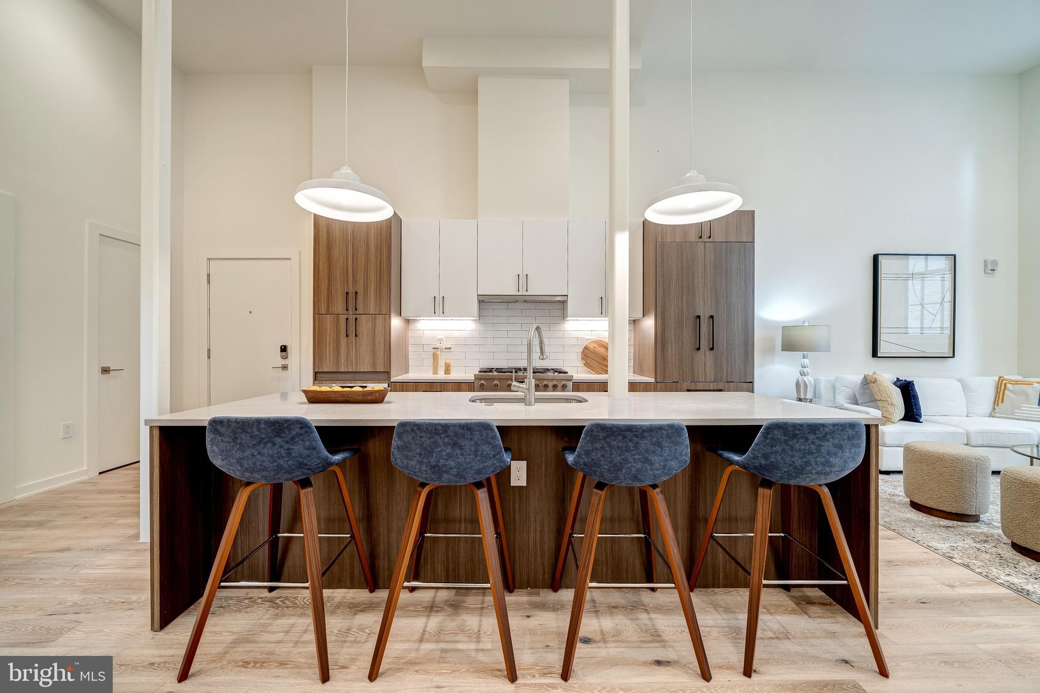 440 R Street Northwest, Unit 103 Washington, DC 20001 - Photo 2 of 22 Gourmet kitchen w/ spacious breakfast bar