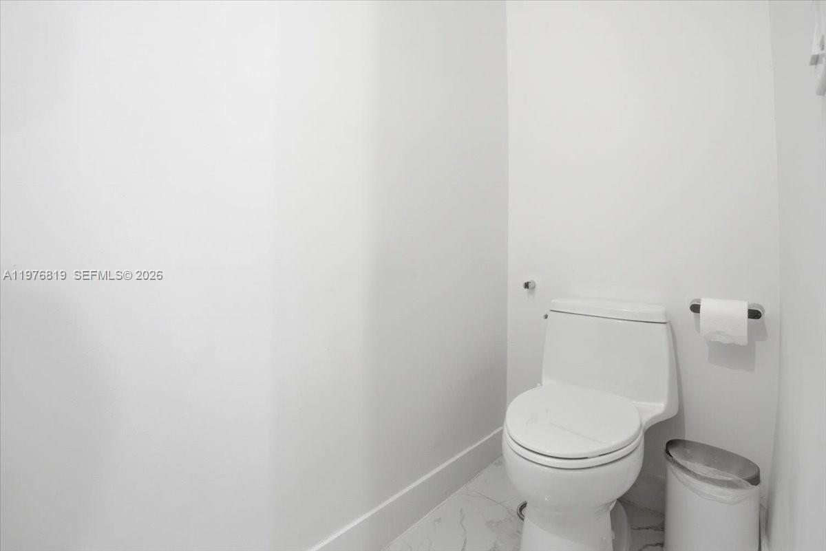 12060 Southwest 82nd Place Miami, FL 33156 - Photo 14 of 41 half bath downstairs