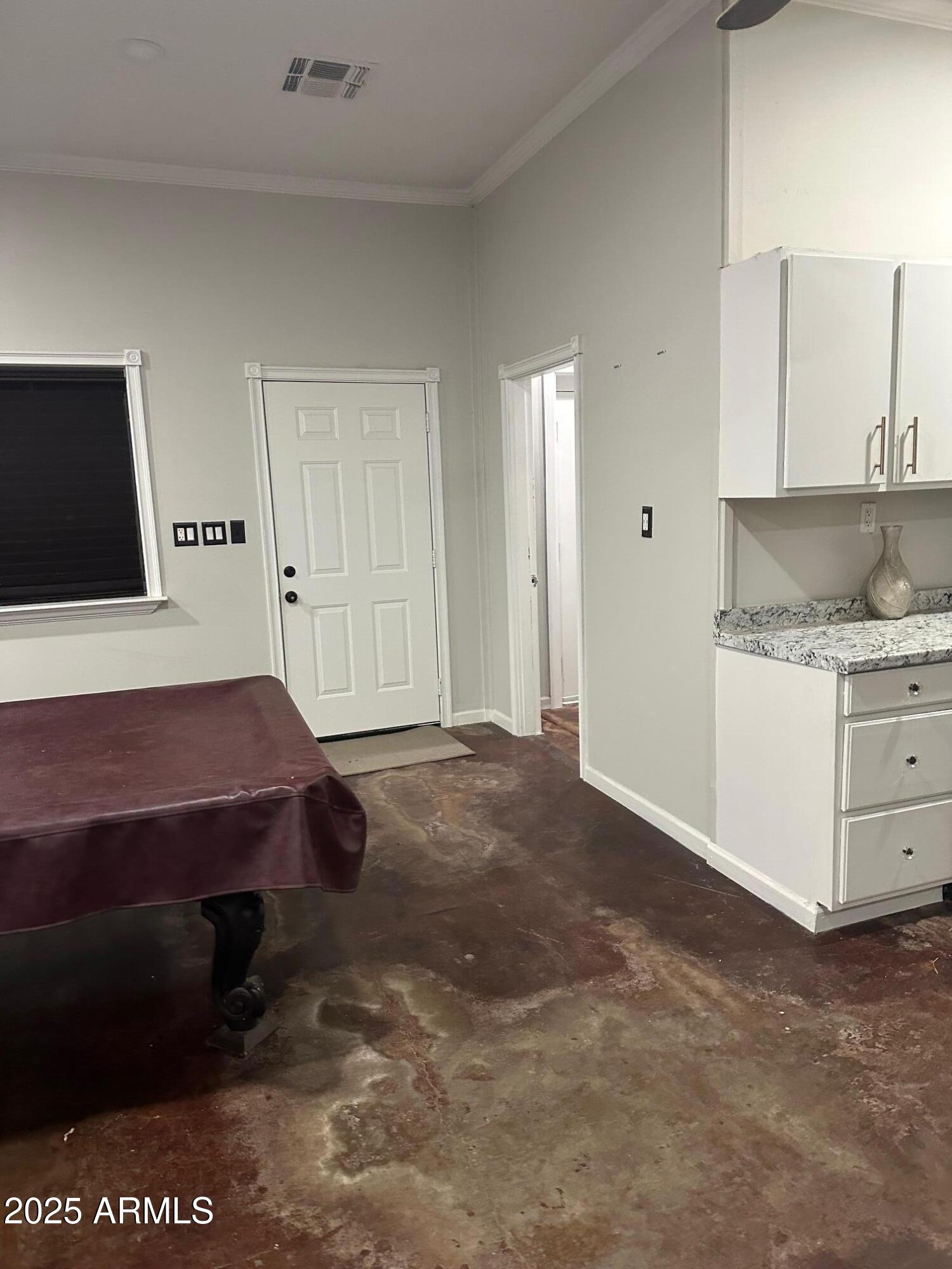 2266 East Willis Road, Unit CASITA Gilbert, AZ 85297 - Photo 12 of 12 a bedroom with a bed and a flat screen tv