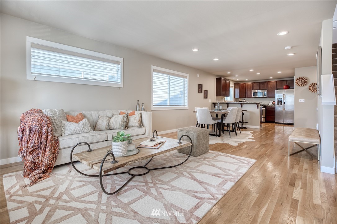 946 North 96th Street Seattle, WA 98103 - Photo 15 of 24 a living room with furniture and kitchen view
