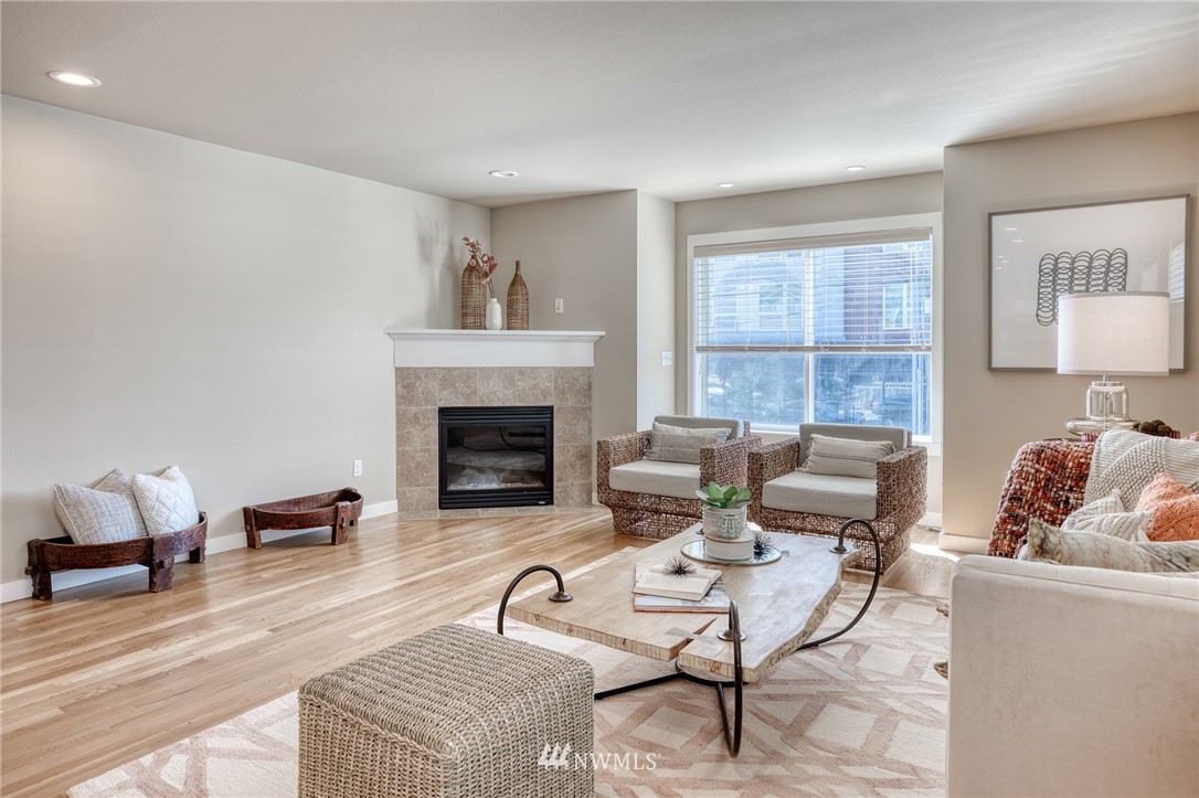 946 North 96th Street Seattle, WA 98103 - Photo 16 of 24 a living room with furniture and a fireplace