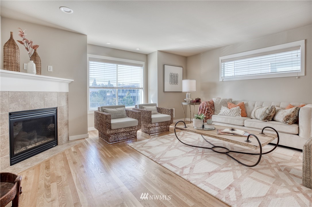 946 North 96th Street Seattle, WA 98103 - Photo 17 of 24 a living room with furniture and a fireplace