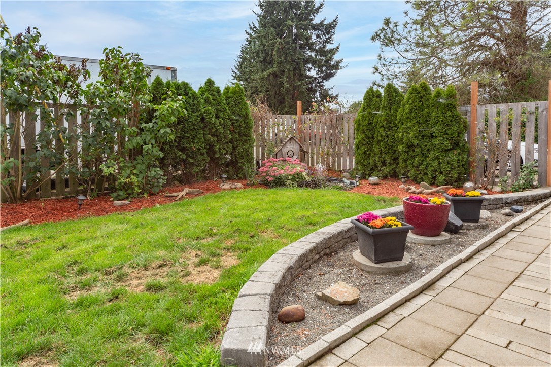 124 Fitzgerald Road Sequim, WA 98382 - Photo 3 of 25 a view of a backyard with sitting area