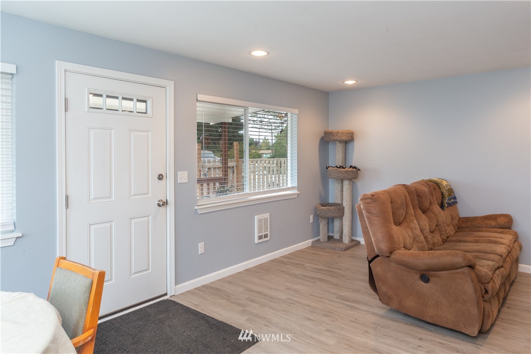 124 Fitzgerald Road Sequim, WA 98382 - Photo 10 of 25 a living room with furniture and a window