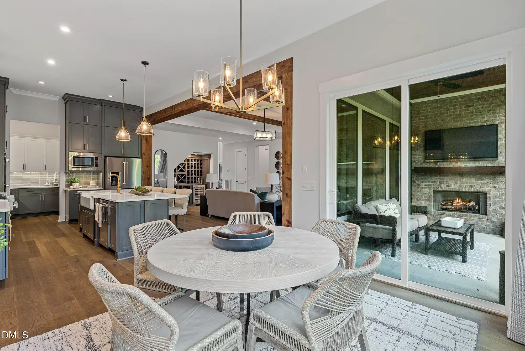 10 Conner Ridge Road Efland, NC 27243 - Photo 6 of 15 a dining room with furniture a rug and kitchen view