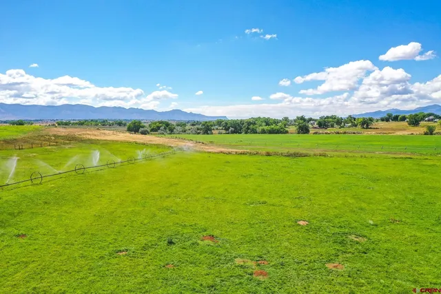 a view of an ocean and a mountain