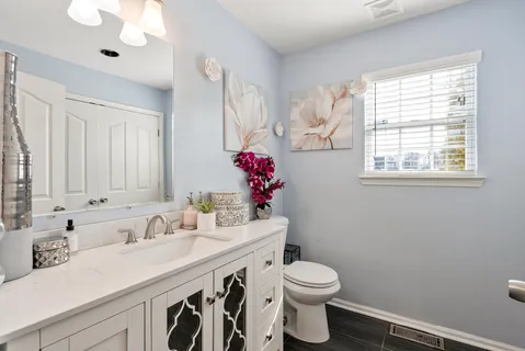 a view of a bathroom with sink bathroom and closet