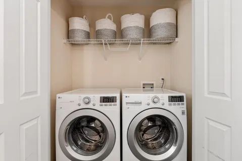 a view of a house with a small yard and plants