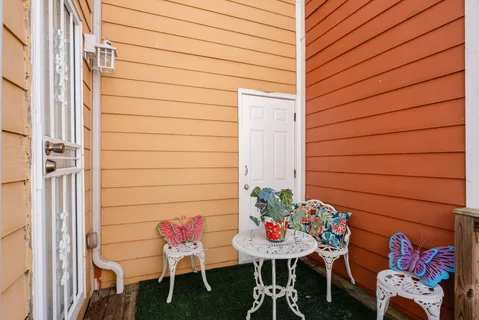 a view of an outdoor space and front view of a house