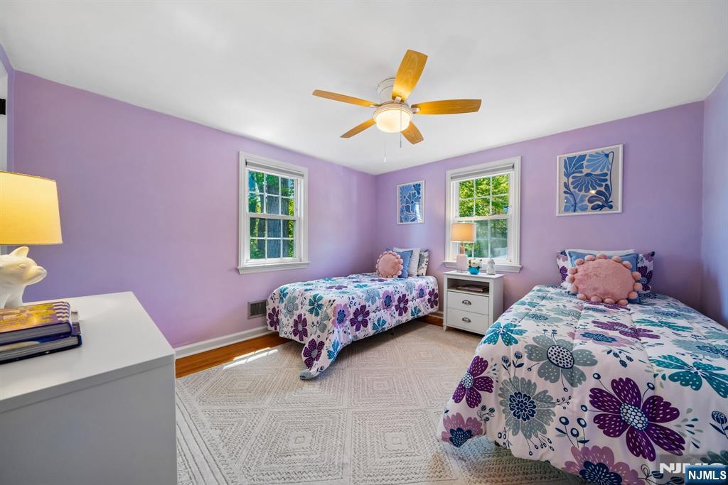 99 Ferncliff Road Bloomfield, NJ 07003 - Photo 17 of 30 a bedroom with a bed and a window