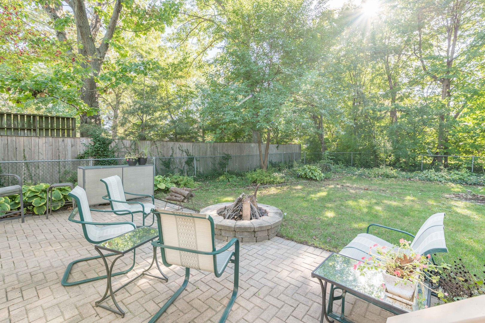 30 Guilford Road Montgomery, IL 60538 - Photo 22 of 22 a view of a chairs and table in backyard of the house