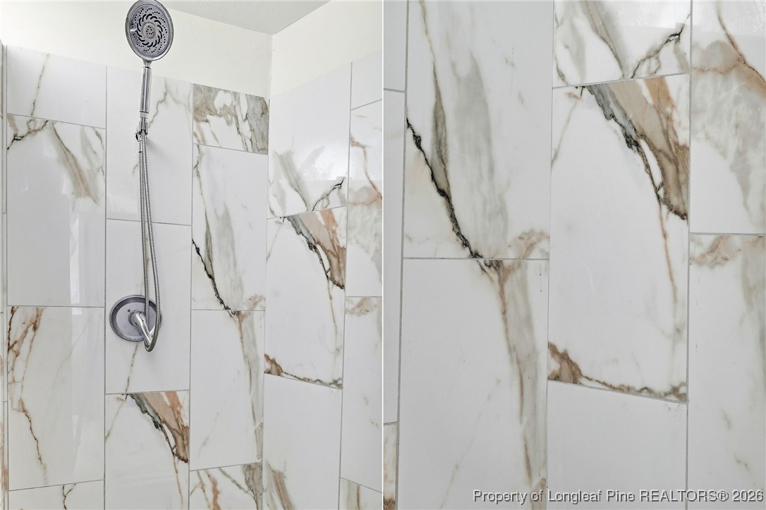 10765 Barker 10 Mile Road St. Pauls, NC 28384 - Photo 13 of 48 a view of entryway with shower and stairs