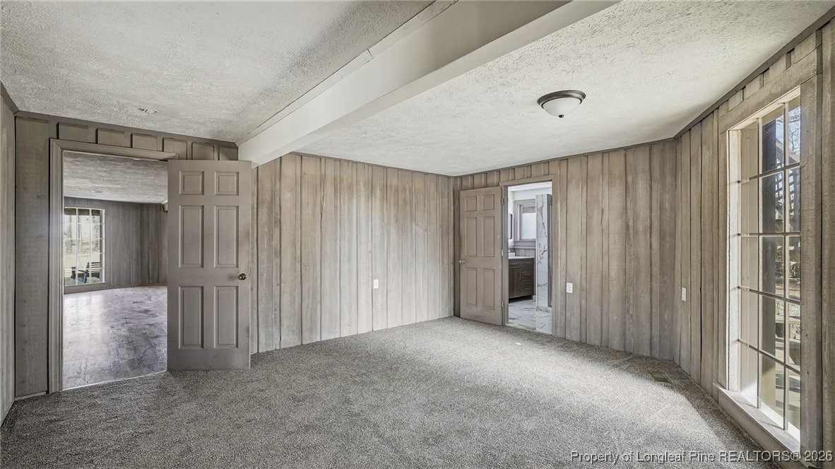 10765 Barker 10 Mile Road St. Pauls, NC 28384 - Photo 22 of 48 a view of a livingroom with an entryway and closet area