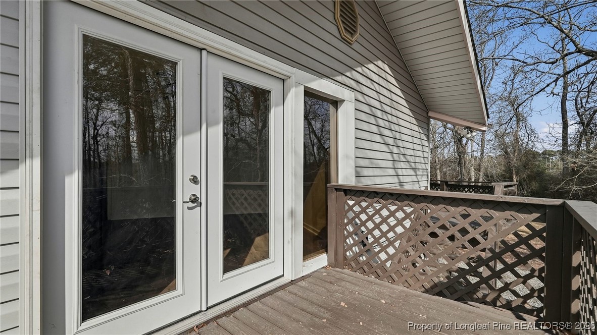 10765 Barker 10 Mile Road St. Pauls, NC 28384 - Photo 29 of 48 a view of a wooden door and a window