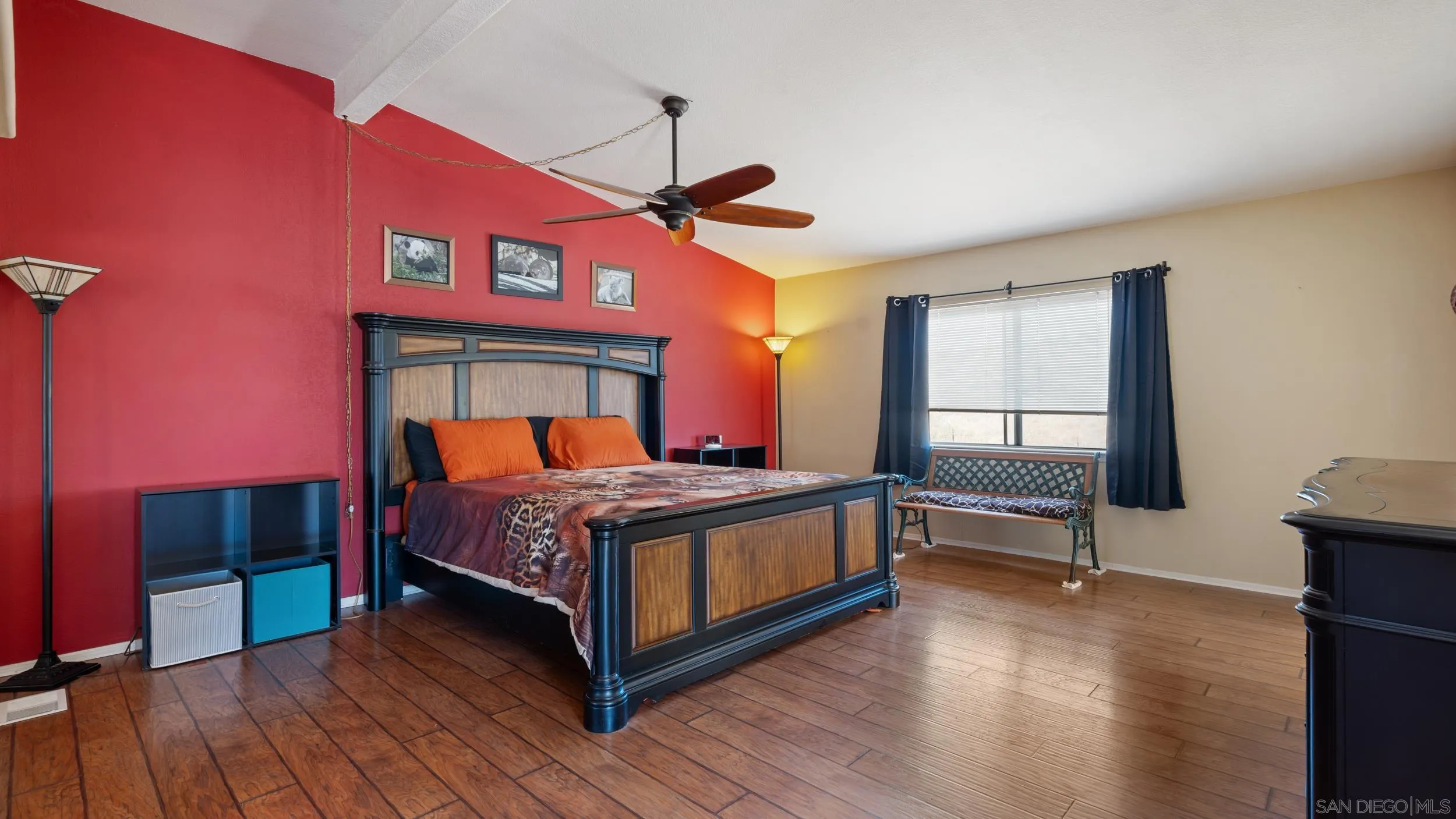 2075 Boulder Oaks Road Potrero, CA 91963 - Photo 19 of 41 a bedroom with a bed and wooden floor