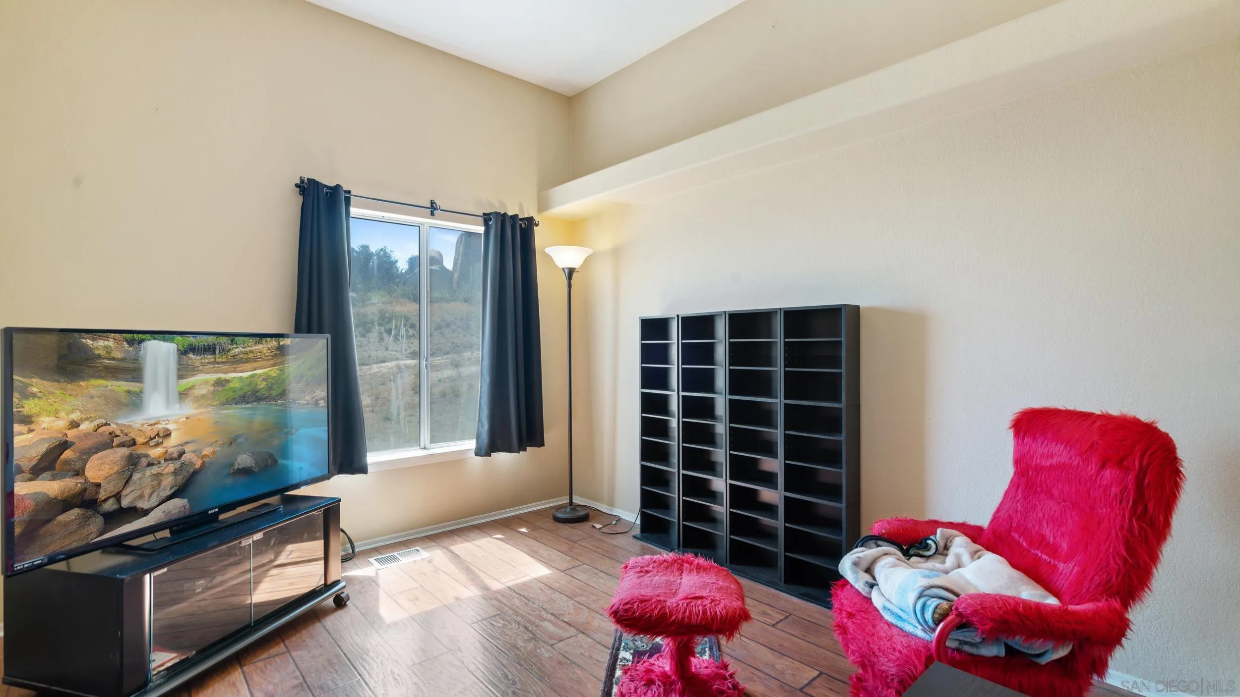2075 Boulder Oaks Road Potrero, CA 91963 - Photo 25 of 41 a bedroom with furniture and a window