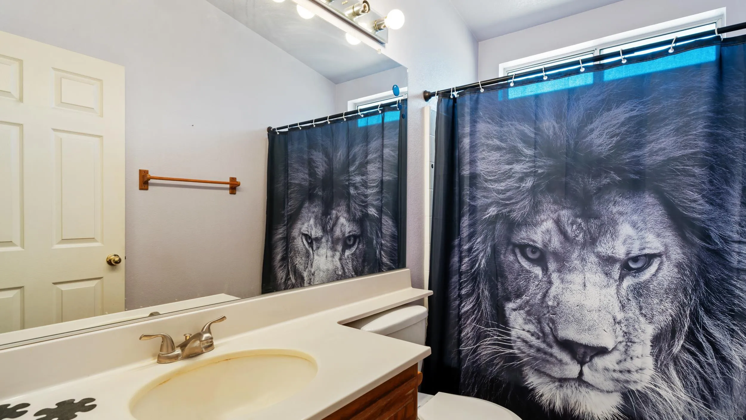 2075 Boulder Oaks Road Potrero, CA 91963 - Photo 27 of 41 a bathroom with a sink and a mirror