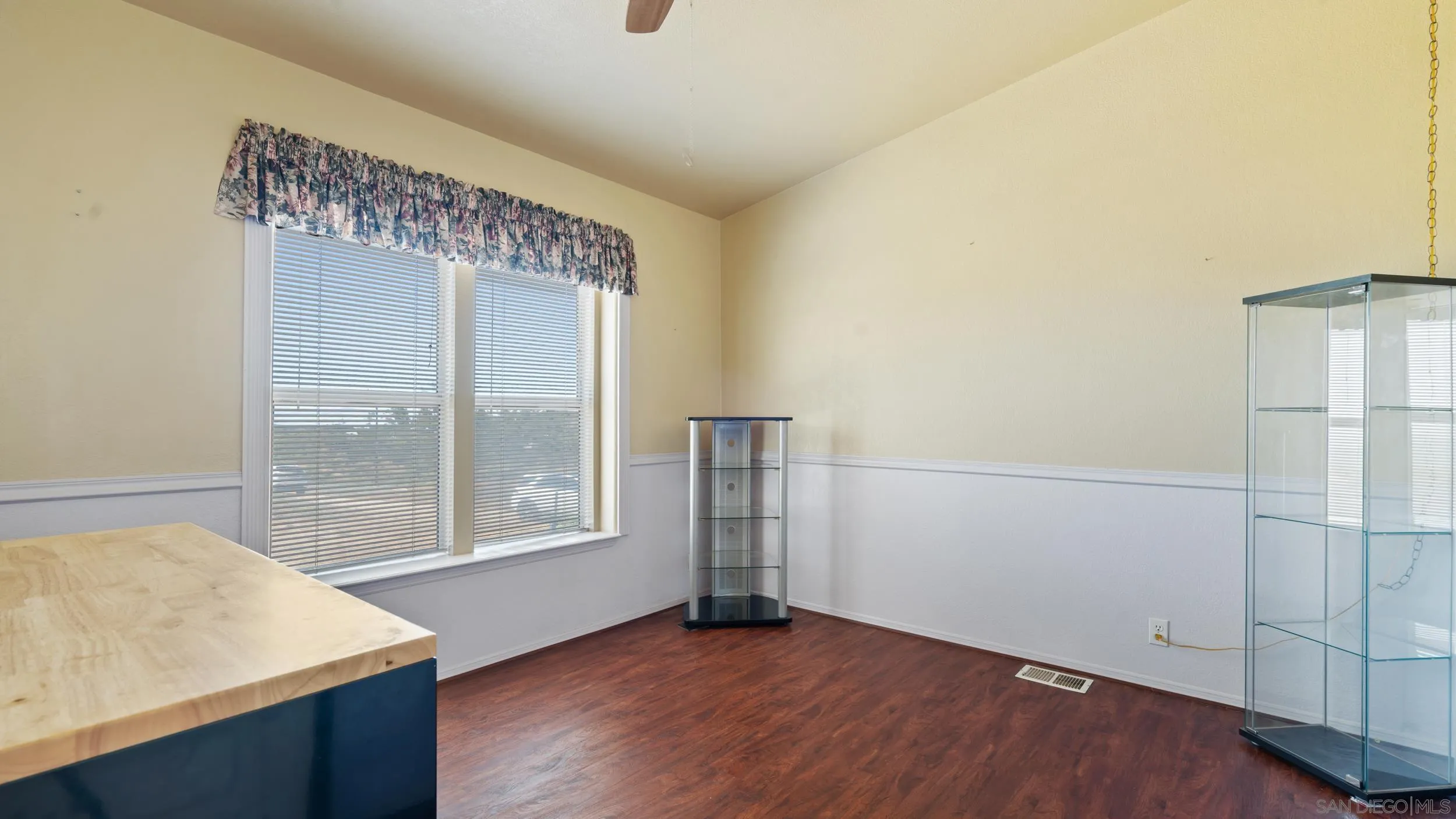 2075 Boulder Oaks Road Potrero, CA 91963 - Photo 28 of 41 an empty room with wooden floor and windows