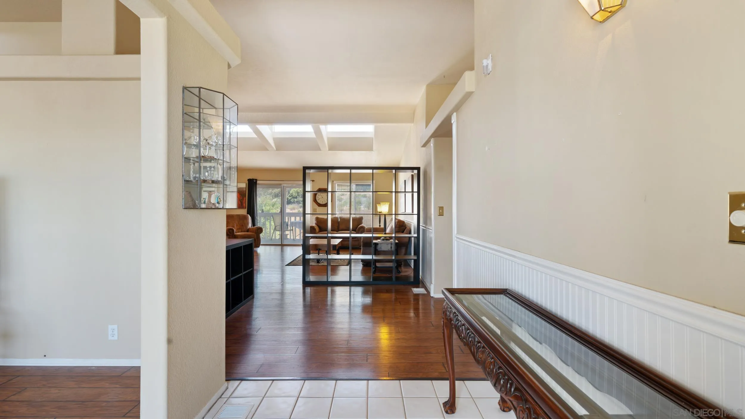 2075 Boulder Oaks Road Potrero, CA 91963 - Photo 8 of 41 a hallway with wooden floor and furniture